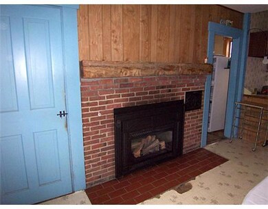 Kitchen. Propane Fireplace in Kitchen