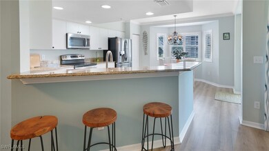 Breakfast bar, dining nook, granite, and stainless