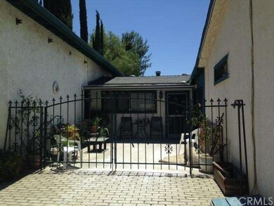 Courtyard showing private entrance to the full apa