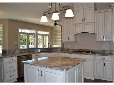 Kitchen. Inviting kitchen with granite counter top
