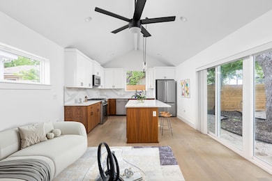 Kitchen with stainless steel appliances, a breakf