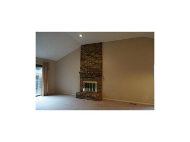 Vaulted ceiling w/floor to ceiling brick fireplace