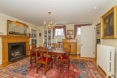 Dining room with wood-burning fireplace