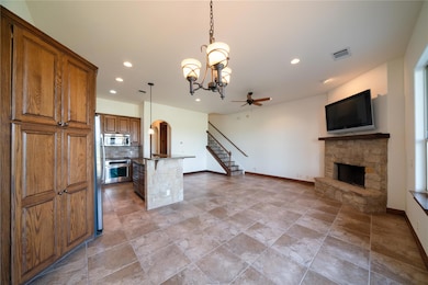 Kitchen featuring appliances with stainless steel