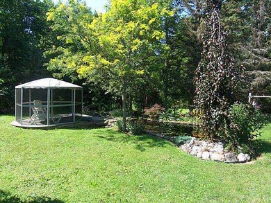 Yard/Garden. The private backyard has a coy pond a