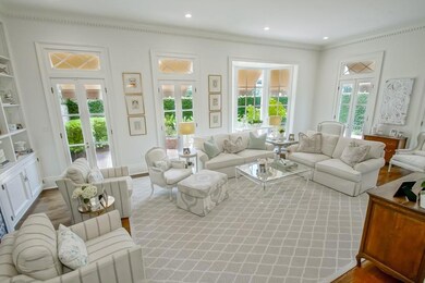 Wraparound French doors leading to patio and garde