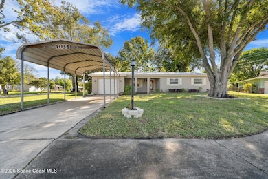 1035 S Mars Ct, Titusville, FL 32796 - photo 2