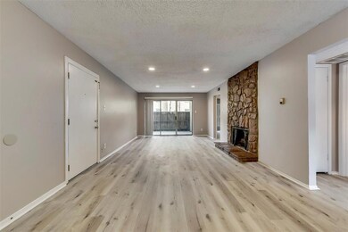 Another view showing front entry door looking towa