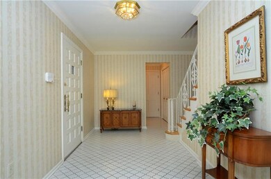 The inviting entry offers ceramic tile floor and c