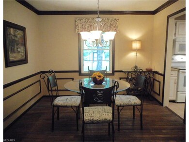 The formal dining room also has hardwood floors, w