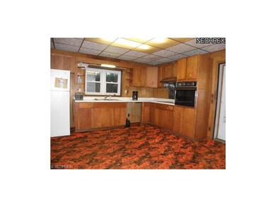Large open kitchen, with rear exit to the back yar