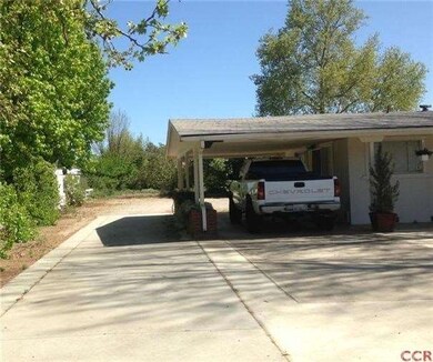 Driveway to rear of property and 2 Car Garage