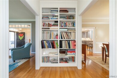 Built in bookcase located between Living and Dinin