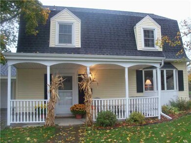 Exterior Front. Lovely covered porch.
