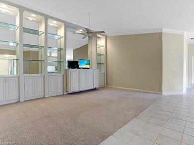 Huge great room with built in cabinets and display