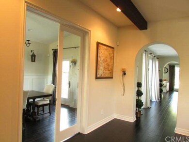 Glass Double French Doors Open to Conference Room/