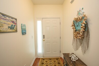Foyer featuring hardwood / wood-style flooring