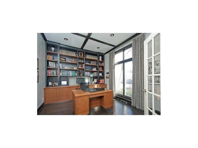Sidelights on built in custom wood bookshelves and