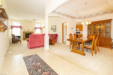 View from Foyer into Great Room and Dining Room...