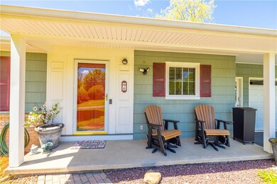 Covered front porch makes time outdoors enjoyable.