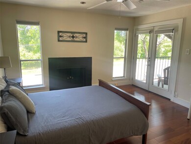 Bedroom with baseboards, recessed lighting, wood 