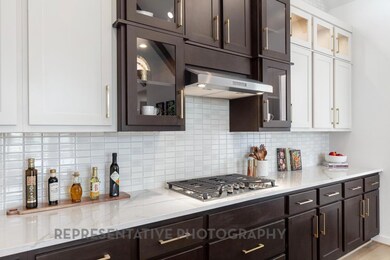 Kitchen featuring stainless steel gas cooktop, da