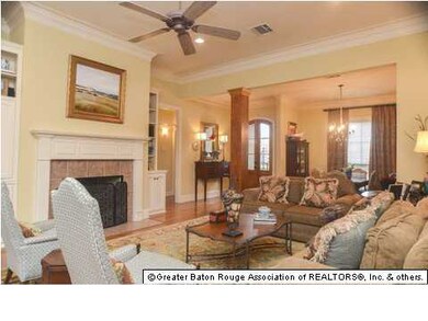 Cypress beam divides foyer/dining/living