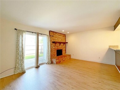 Unit 810: Living Room with wood burning Fireplace.