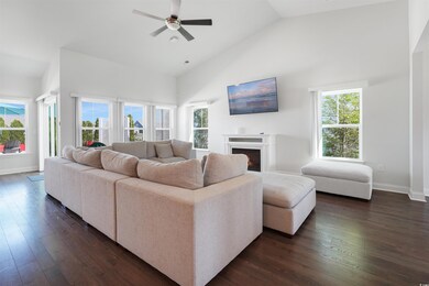 Vaulted ceilings, fireplace, loads of natural ligh
