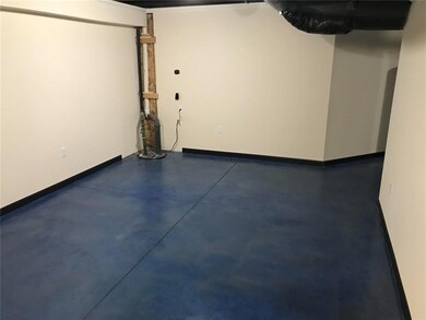 One of two large lower level storage rooms for cra