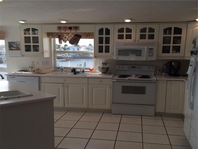Kitchen. A VERY OPEN KITCHEN AREA WITH VIEWS OF TH