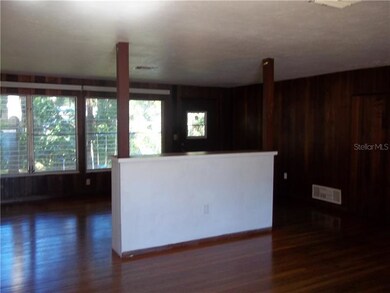 Oversized living room area with built in bookcase 