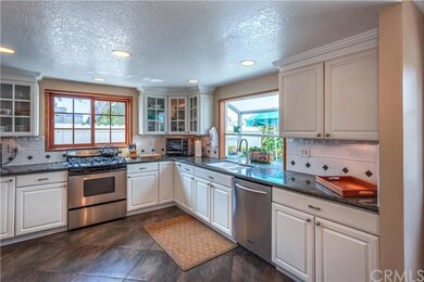 The kitchen is large and open with plenty of count
