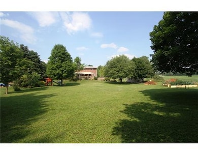 Land. Koi ponds, gardens, and lots of shade trees 