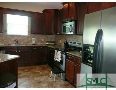 Kitchen. BEAUTIFUL KITCHEN FEATURES GRANITE COUNTE