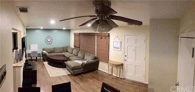 Cozy living room with accent wall. Sellers are wil
