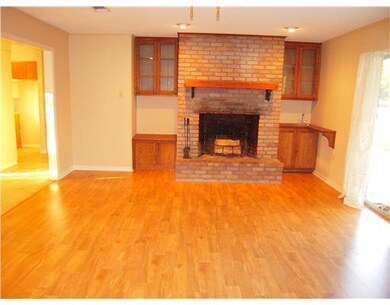 Living Room. Wood burning fireplace, wetbar and ba
