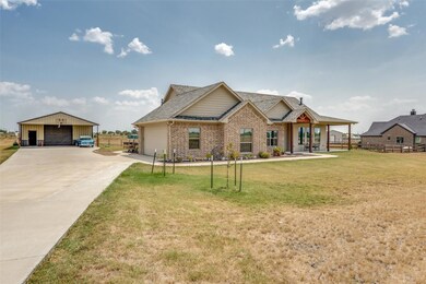 This property also has a 30 x 40 fully insulated shop with 15' overhang on the front and a half bath!