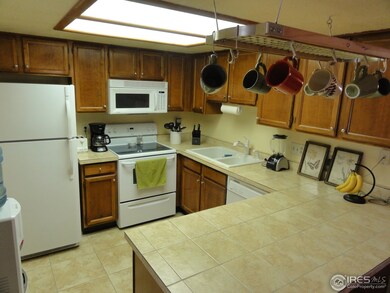 TILED KITCHEN FLOOR AND COUNTERTOPS