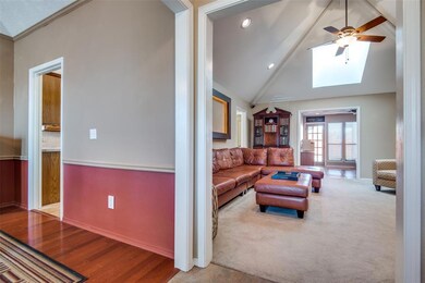 Large living room is accessible from hallway