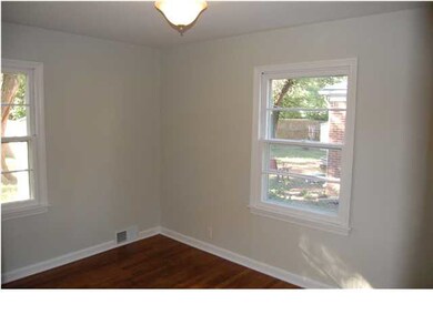 BEDROOM #2 WITH WOOD FLOORS