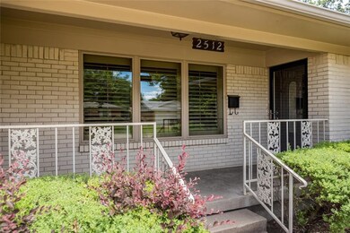 Adorable porch with updated front door.