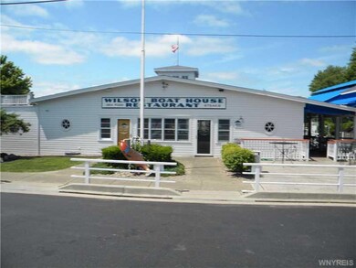 Exterior Front. Across from Harbor and Wilson Boat