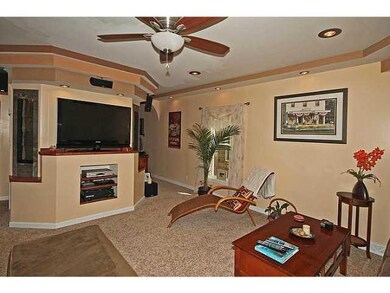 Living Room. check out the waterfalls next to TV. 