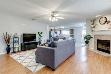 Living room featuring light wood-type flooring, a 