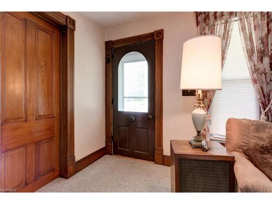 Original hardwood front door and beautiful raised 