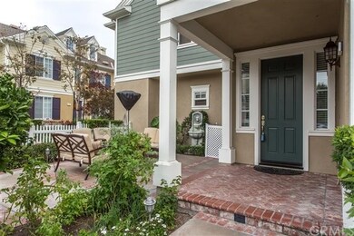 Brick entry to your white picket fence yard. 