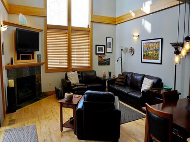 Open great room with Soaring 20' Vaults