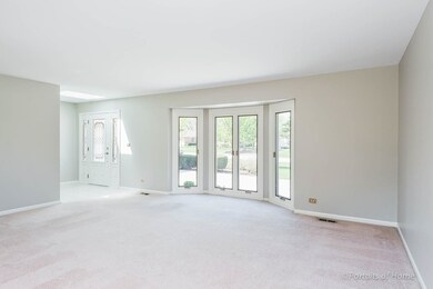 Large open living room has been freshly painted an
