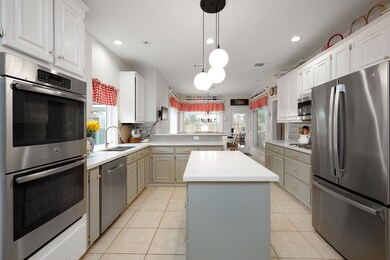 Beautiful updated kitchen with large island, doubl